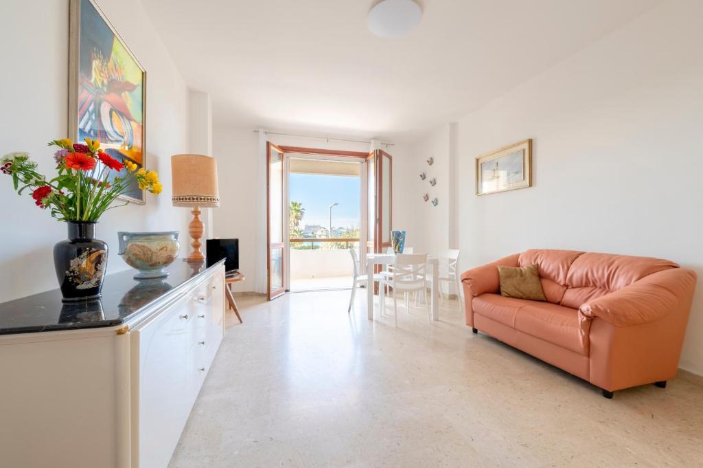 a living room with a couch and a table at Stella Vacanze in Otranto