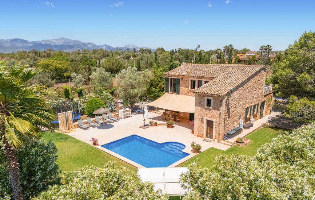 an aerial view of a house with a swimming pool at Finca Kiana in Sencelles