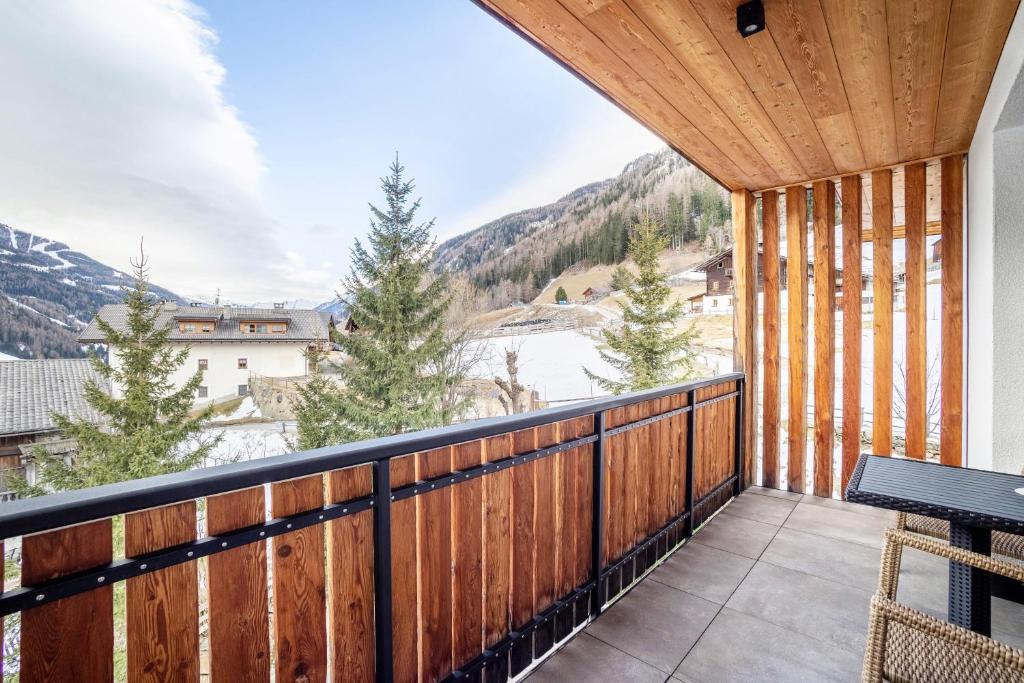 a balcony with a view of the mountains at Stoana Apt 4-1 in San Giacomo