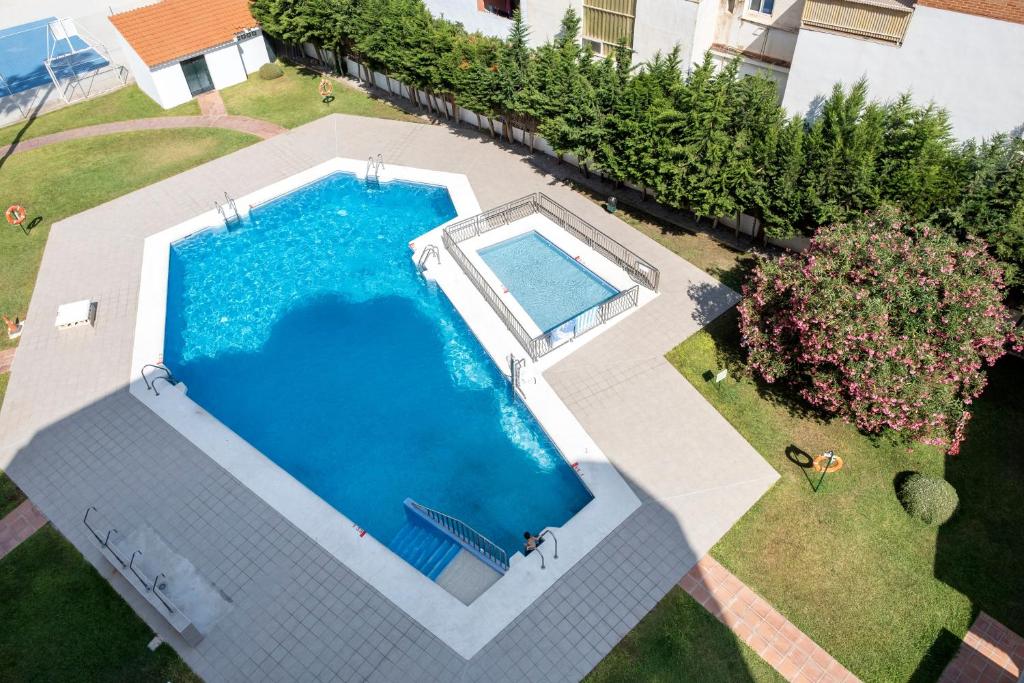 an overhead view of a swimming pool in a yard at Torre del Mar Studio in Torre del Mar