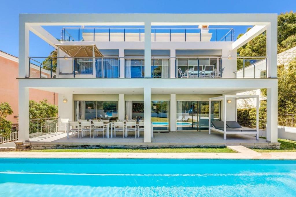 an image of a house with a pool at Gemelos in Alcudia