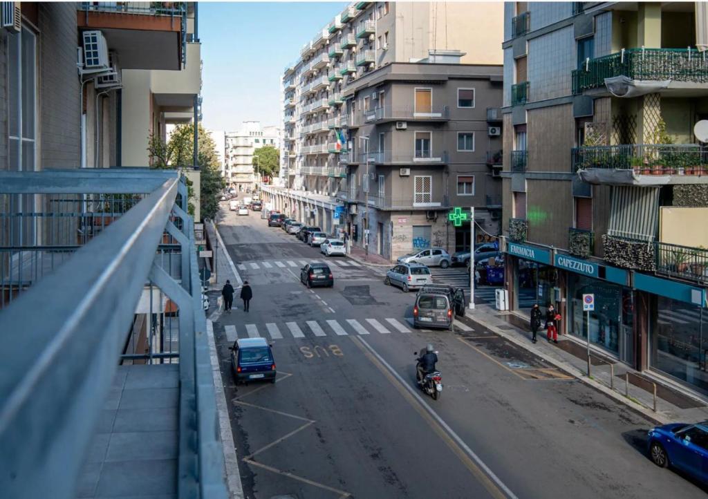 a view of a city street with cars and motorcycles at Il Centro Luxury Suites in Bari