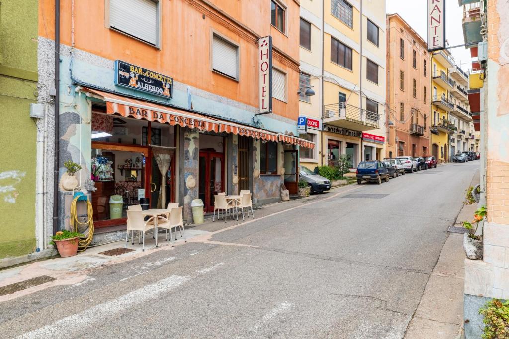 an empty street in a city with buildings at Hotel Da Concetta a Jerzu in Jerzu
