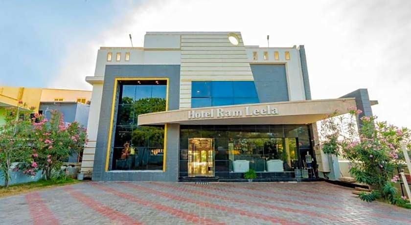 a building with a store in front of it at Hotel Ramleela in Rāmeswaram