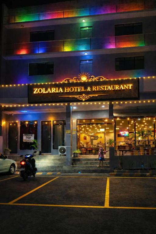 a hotel with a sign that reads kotaota hotel and restaurant at Zolaria Hotel and Restaurant in Tagaytay
