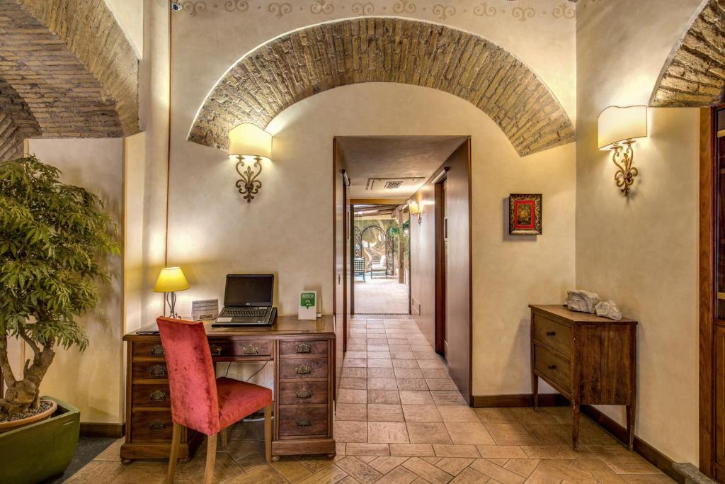 Telewizja i/lub zestaw kina domowego w obiekcie Residenza San Calisto