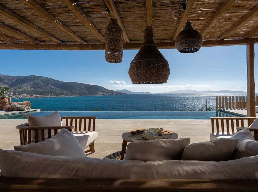a living room with a view of the ocean at Villa Noema in Agiassos