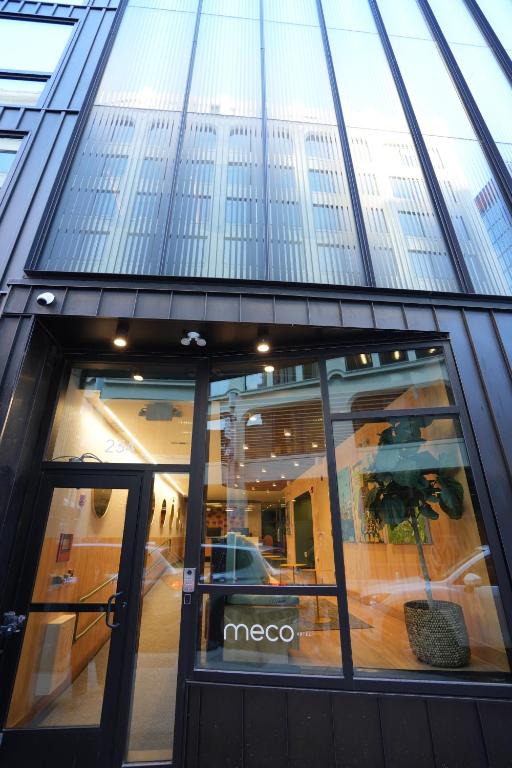 a meco store with a sign in the window at Meco Hotel in Boston