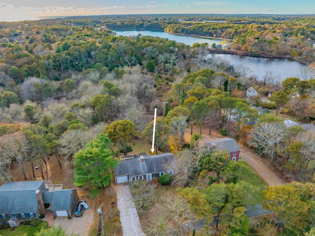 an aerial view of a home with a river and trees at Spacious Dog-Friendly Retreat in Chatham in Chatham