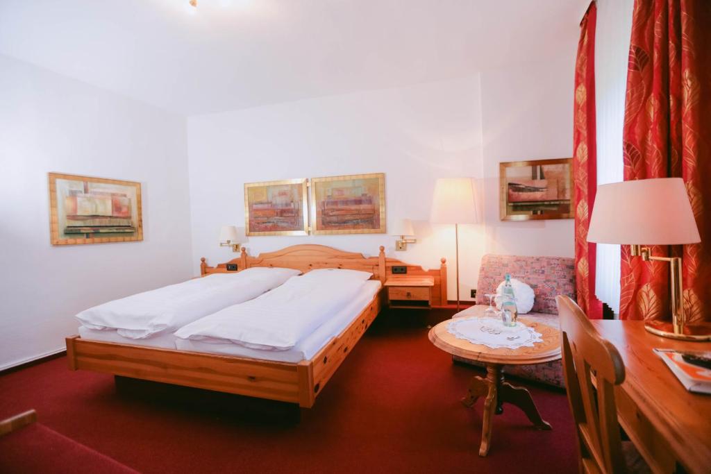 Postel nebo postele na pokoji v ubytování Gasthof Willenbrink