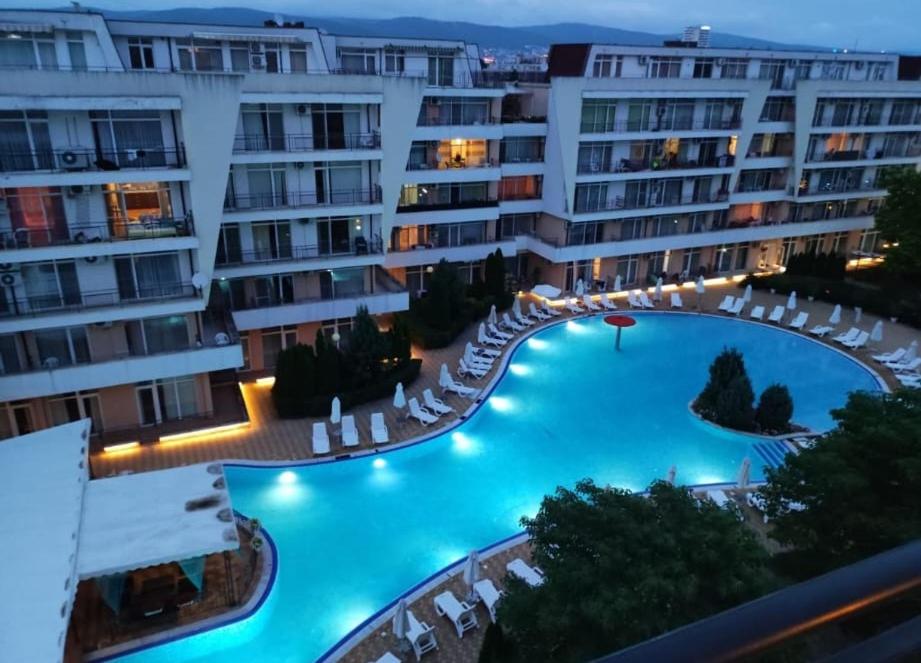 an image of a swimming pool in a building at Luxury Penthouse Studio with Outdoor Hot Tub and Panoramic Views in Sunny Beach