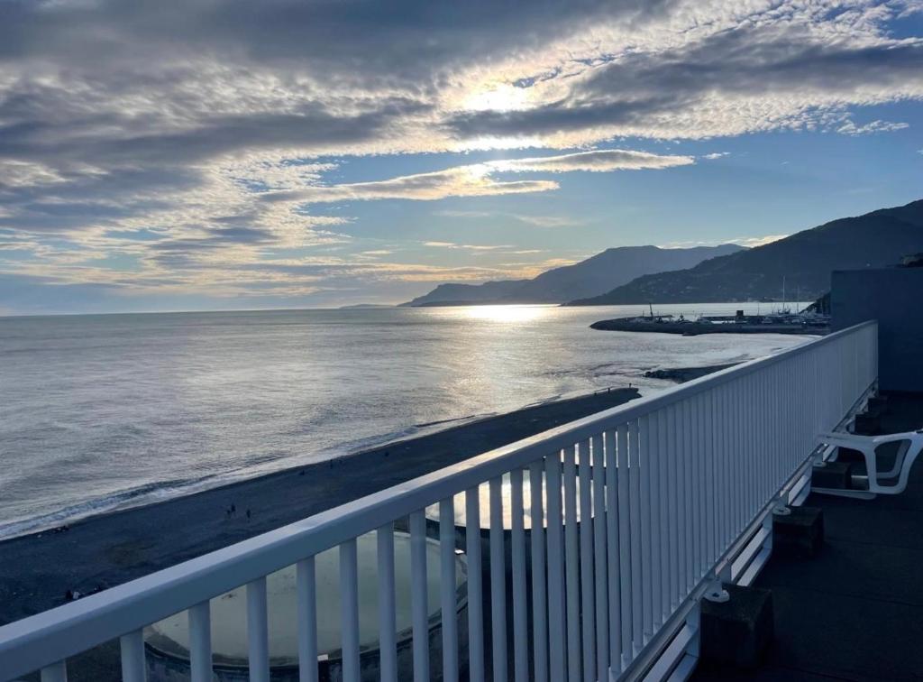 a view of the ocean from a balcony at El mar in Ventimiglia