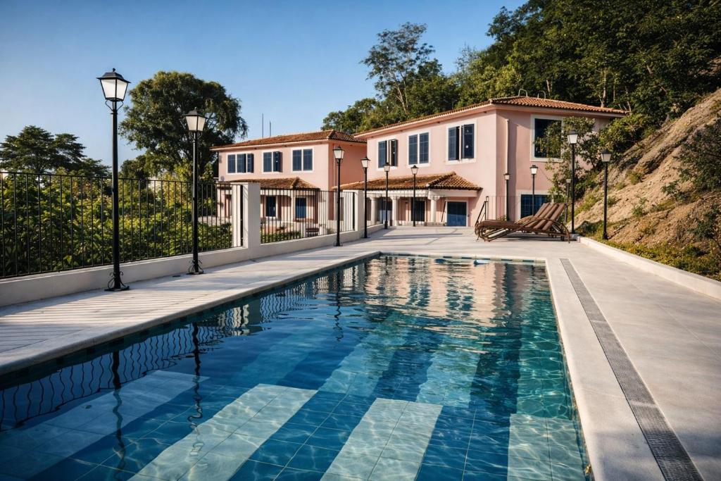 a swimming pool in front of a house at Altos de Colombo Guest House Boutique - Soft Opening in Rio de Janeiro