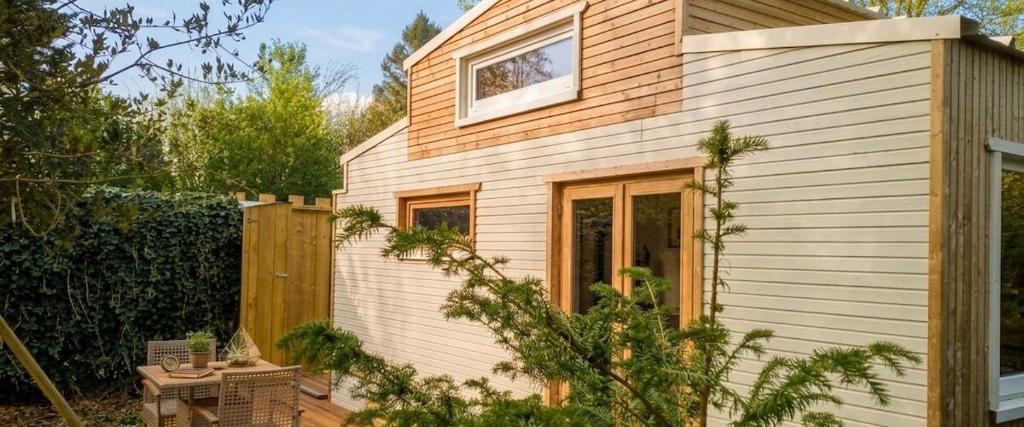 a small house with a window on top of it at La tiny house perdue in Saint-Blimont