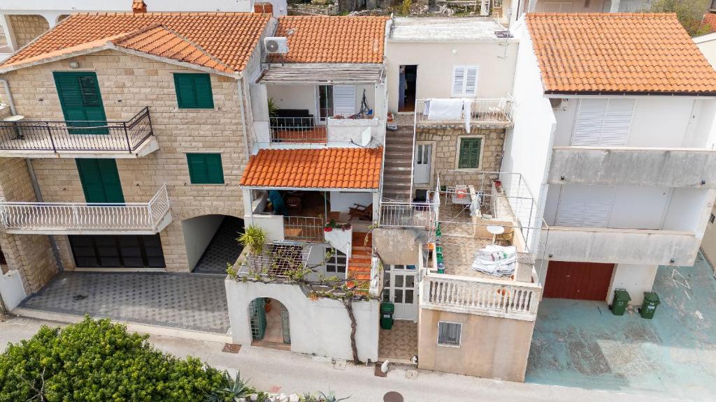 an overhead view of a building with orange roofs at Apartment Bezerusa in Igrane