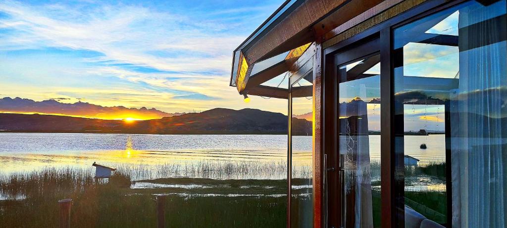 a view of a lake from the window of a house at Los Uros in Puno