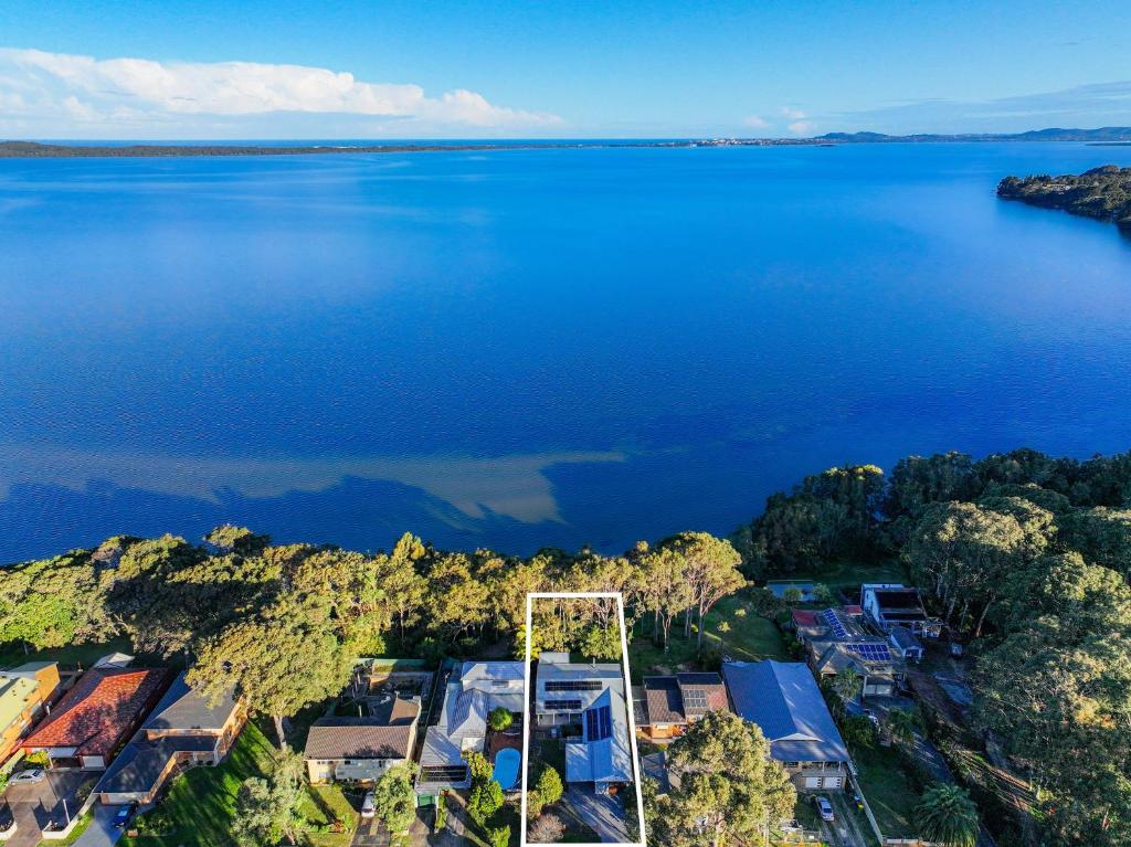 an aerial view of a large body of water at Waterside Whispers in Gorokan