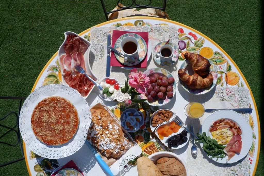 a table with a variety of food on it at Terra e Mare in Santa Maria Pietrafitta
