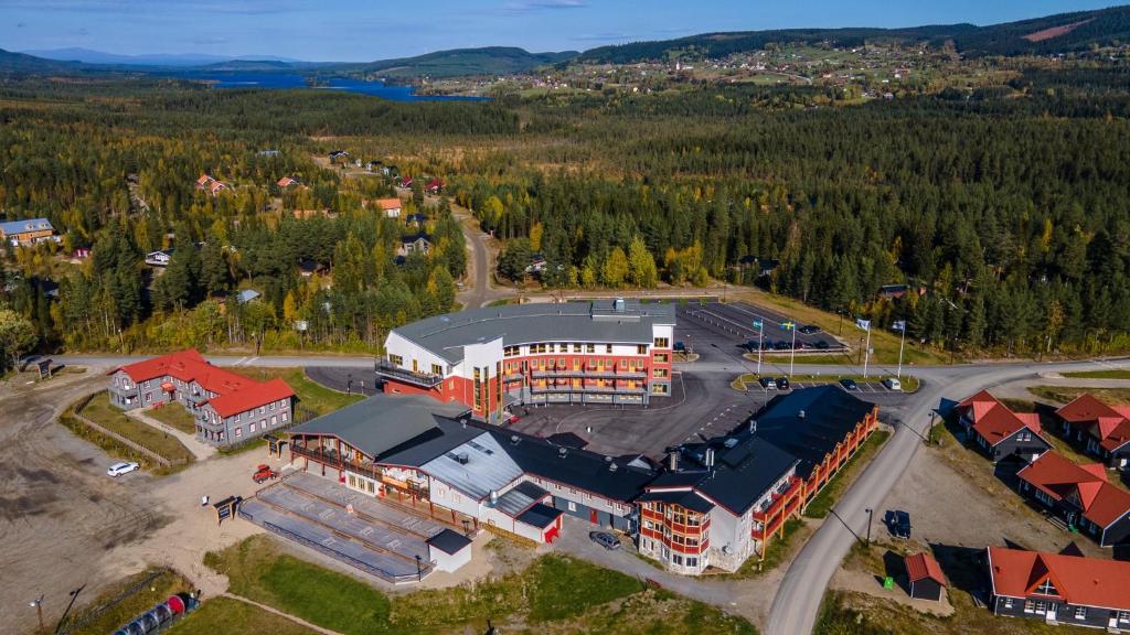 an aerial view of a large building in the mountains at Apartments Klövsjöfjäll in Klövsjö