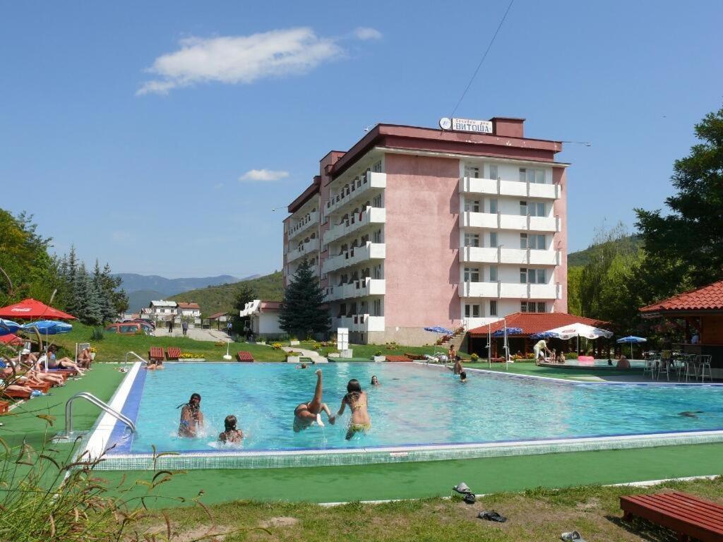 a group of people in a swimming pool at a hotel at Почивна станция Витоша in Velingrad