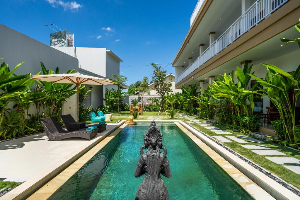 an elephant in the pool of a house at Maha Prana Kedungu by Aayan in Tanah Lot