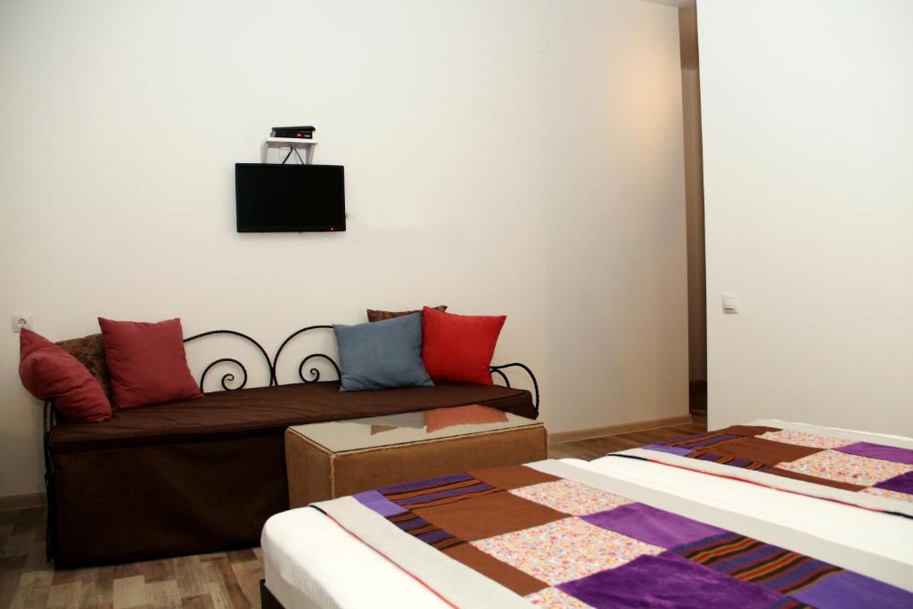 Postel nebo postele na pokoji v ubytování Hotel Delisi