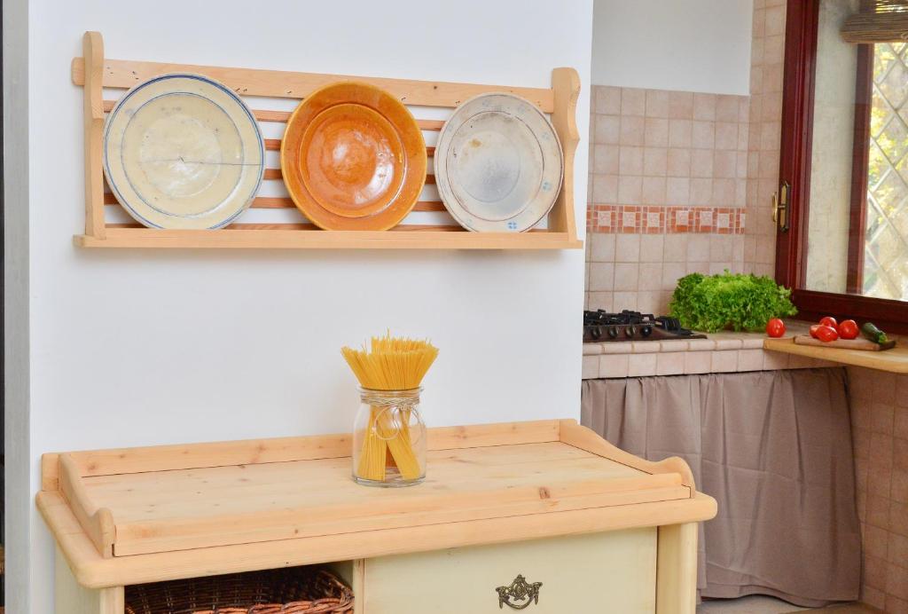 A kitchen or kitchenette at Trullo L'alcova