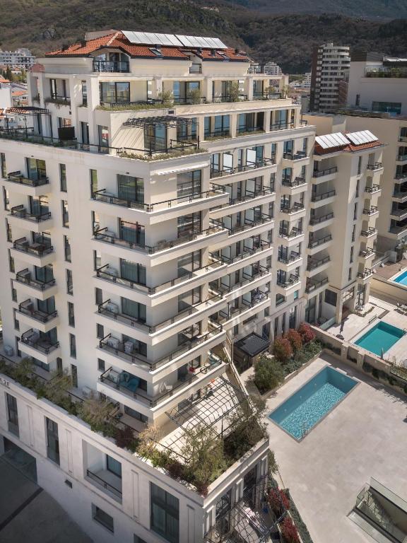 an aerial view of a large white apartment building at CASA AL MARE by Moskva in Budva