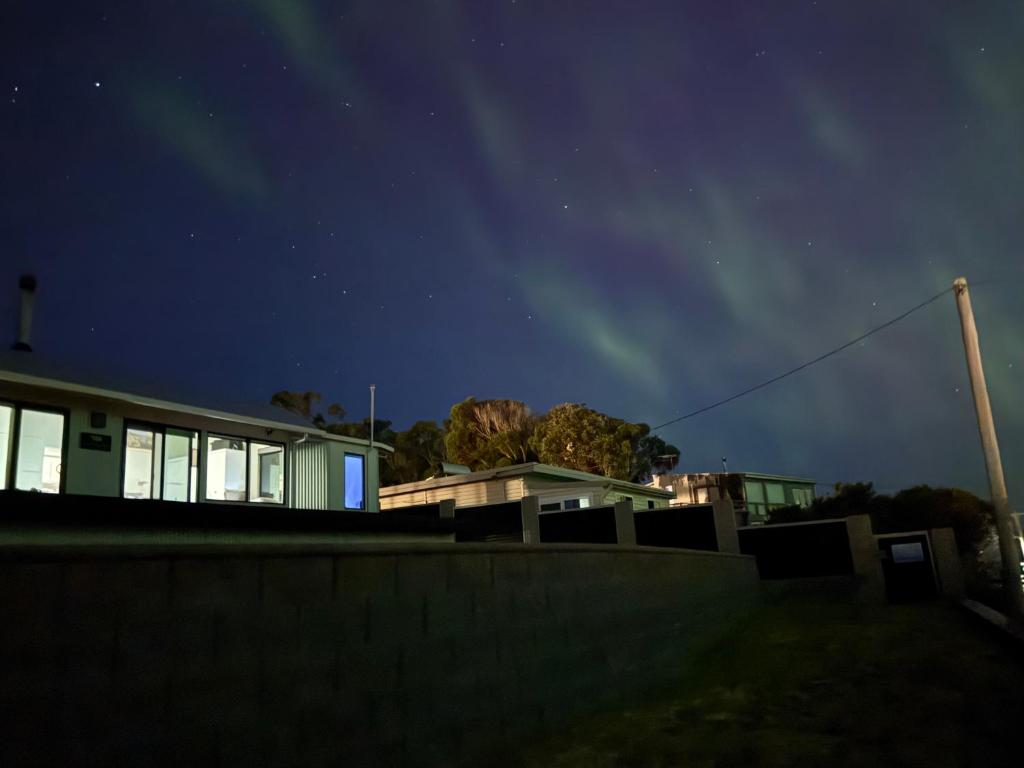 a house at night with the stars in the sky at Park Beach Retreat in Dodges Ferry