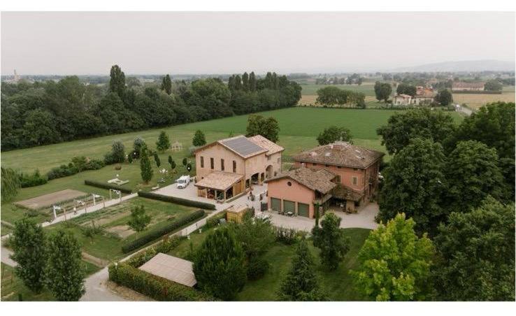 an aerial view of a large house in a field at Casa Tarabuso B&B in Reggio Emilia