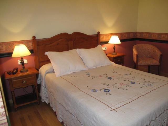 Postel nebo postele na pokoji v ubytování Hotel Casa Anita