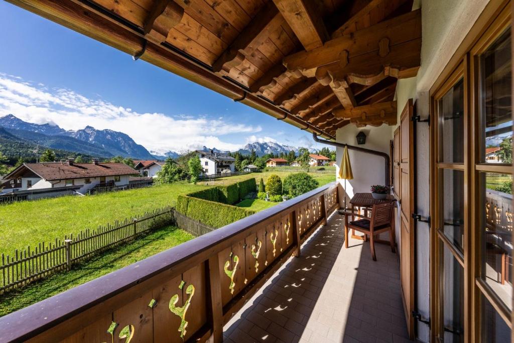 a balcony with a view of the mountains at Haus Lara - Fewo 2 in Wallgau