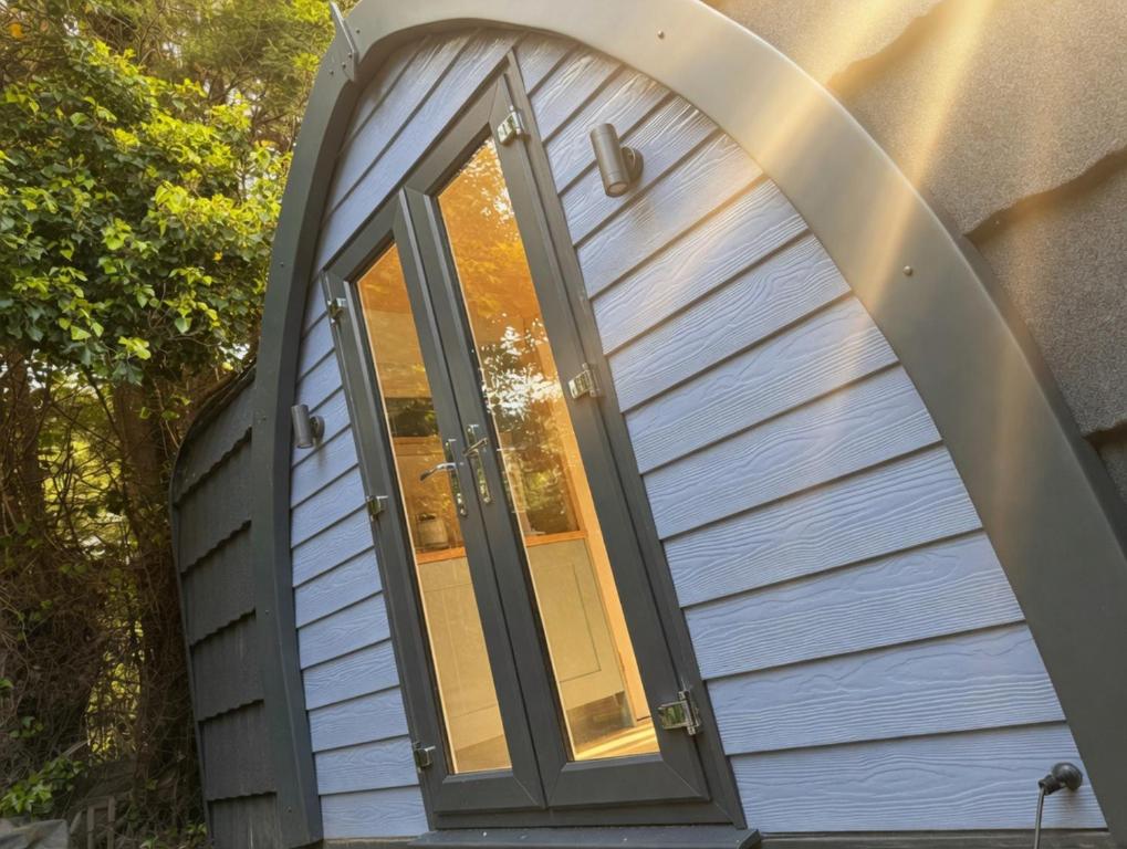 an arched window on the side of a house at Avondale Lytham - Private Luxury Pod - Walk to Lytham Green in Lytham St Annes