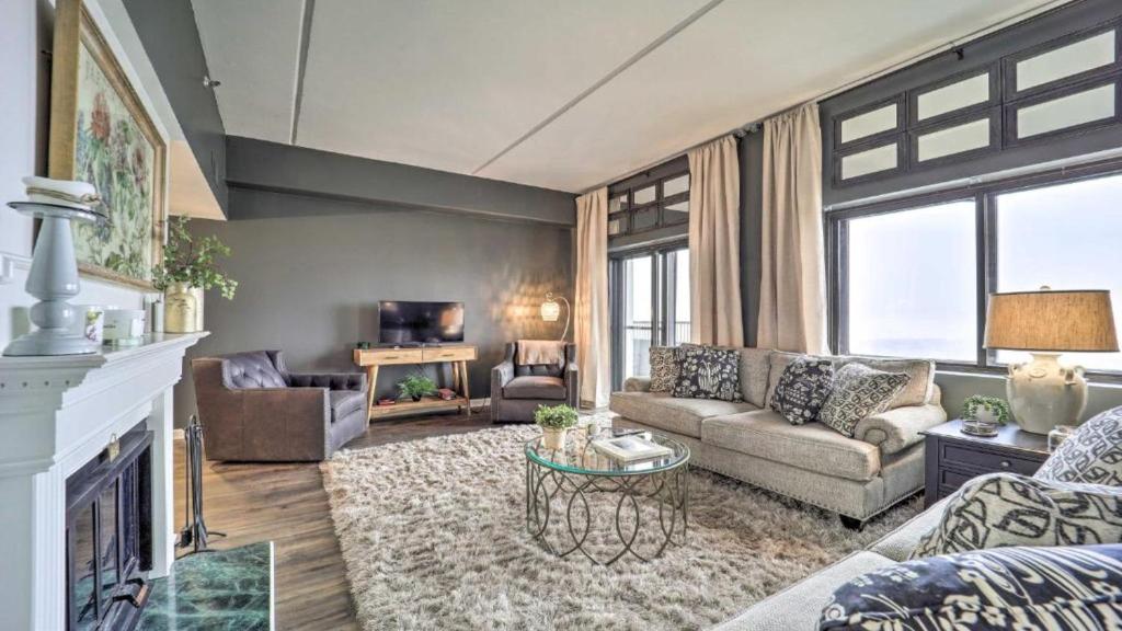 a living room with a couch and a fireplace at 3 Mi to Skiing Mtn-View Condo in Sugar Top Resort in Sugar Mountain