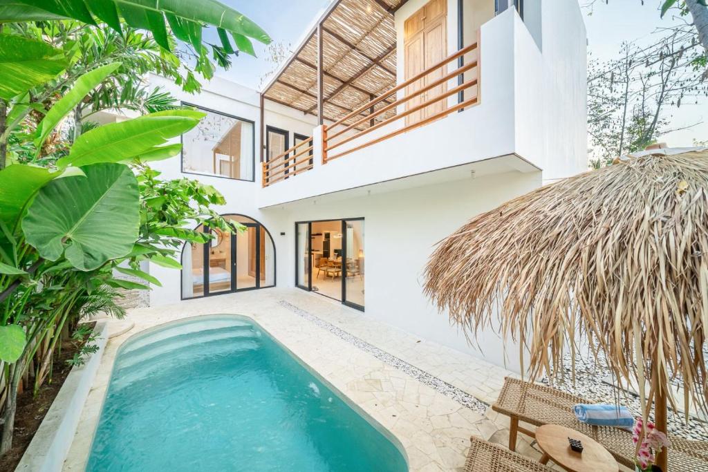 a pool in the backyard of a villa at Casa Myla Luxury Villa - Bingin in Badung
