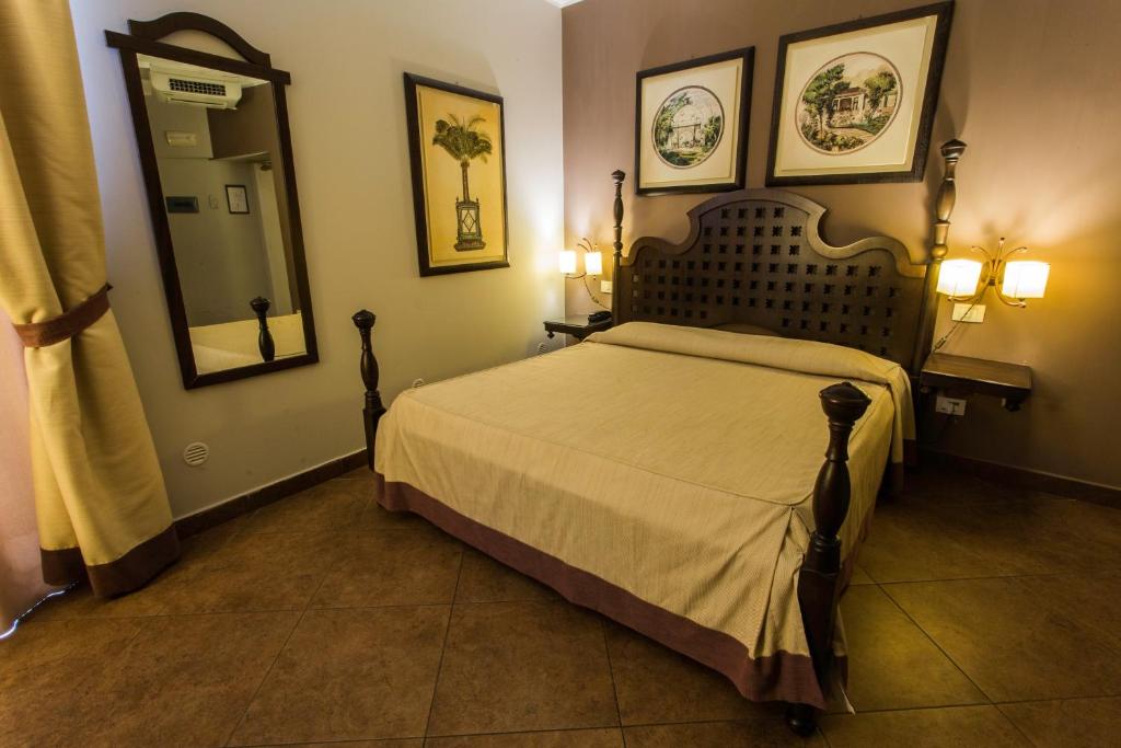 Postel nebo postele na pokoji v ubytování Hotel dei Coloniali
