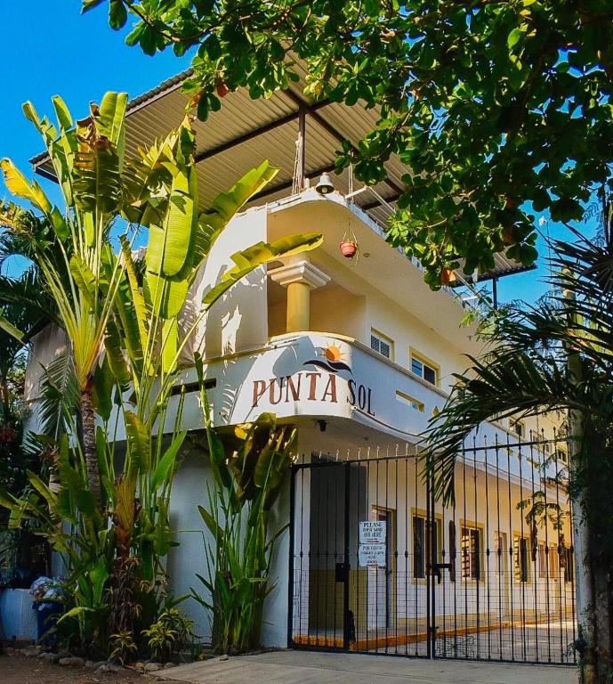 a building with a sign that reads purina sun at Punta Sol in Brisas de Zicatela