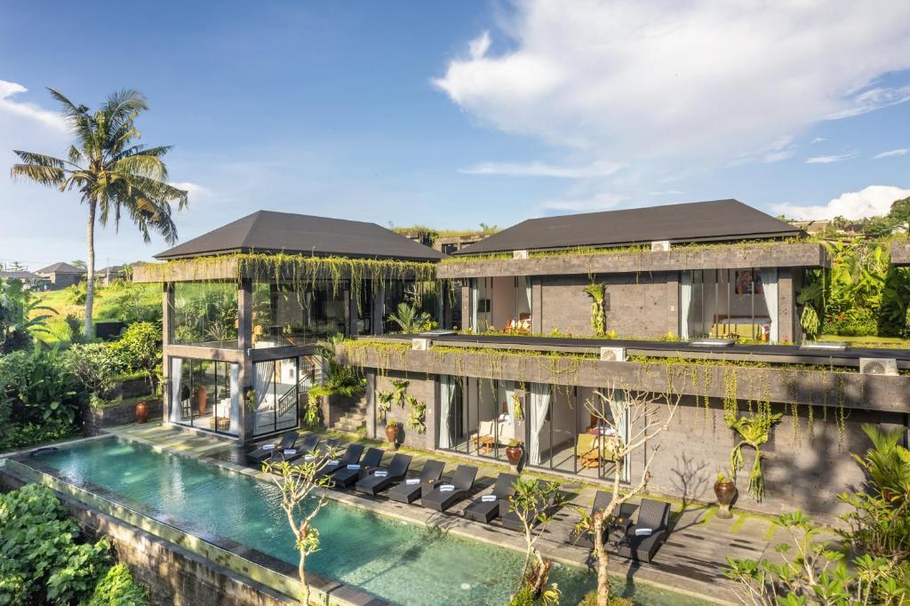 an aerial view of a villa with a swimming pool at The Garden Villas in Ubud