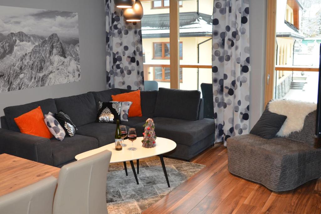 Posedenie v ubytovaní Apartament Ornak