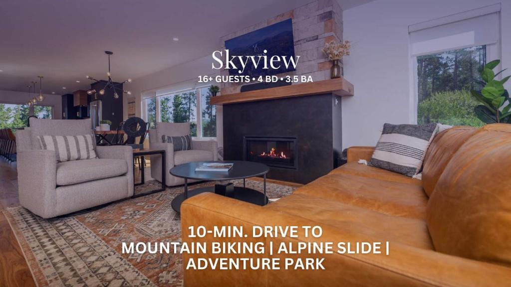 a living room with a couch and a fireplace at Skyview in Fraser