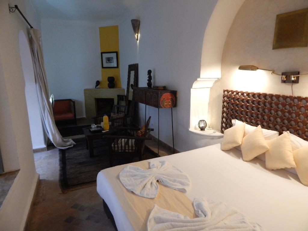 Postel nebo postele na pokoji v ubytování Riad De Vinci & SPA