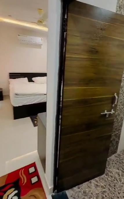 a door to a bedroom with a bed in a room at Zoz jhodpur in Jodhpur