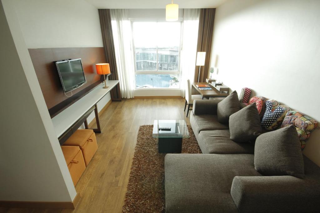 TV a/nebo společenská místnost v ubytování Prajaktra Design Hotel