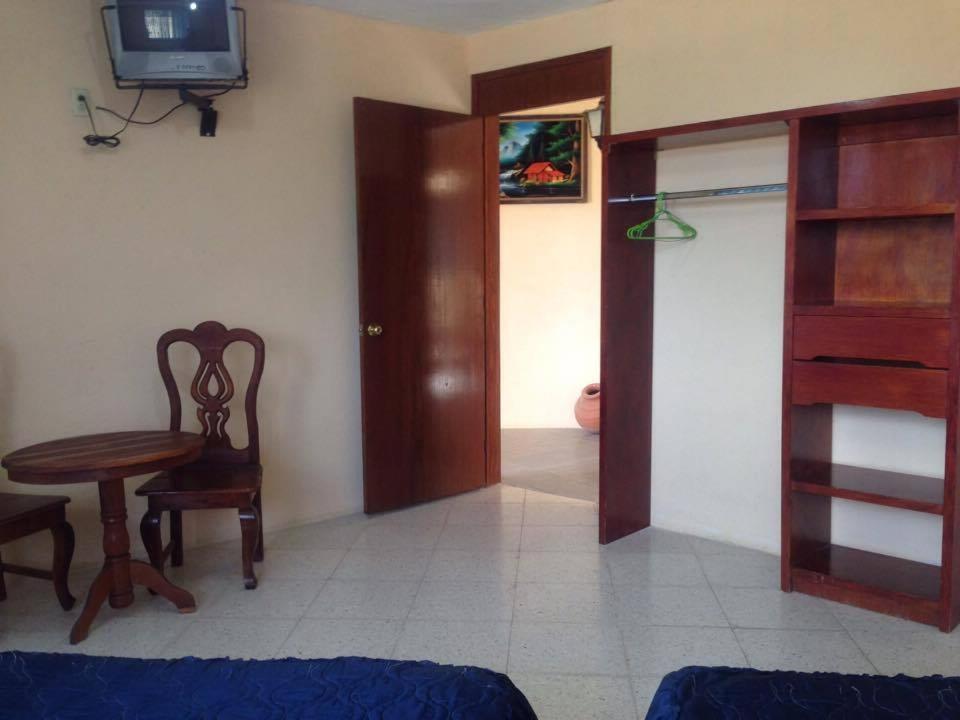 Postel nebo postele na pokoji v ubytování Hotel Lienzo Charro 1