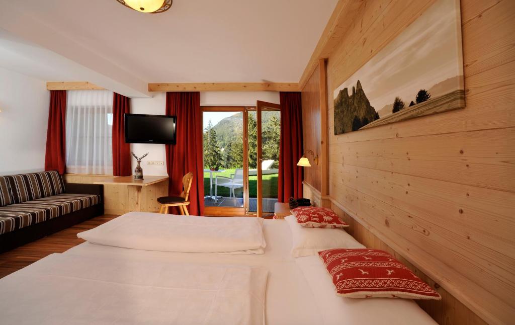 Postel nebo postele na pokoji v ubytování Hotel Digon