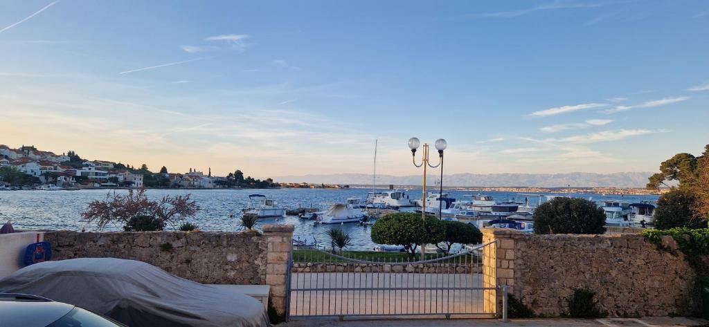 a view of a marina with boats in the water at Blue Pearl Seafront in Preko
