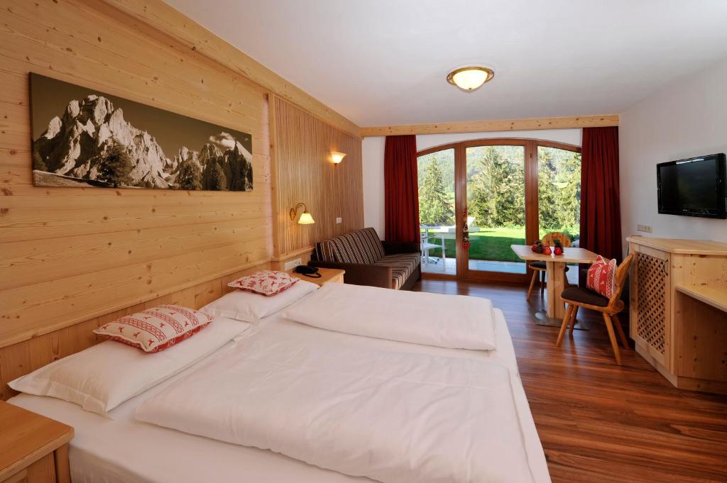 TV a/nebo společenská místnost v ubytování Hotel Digon