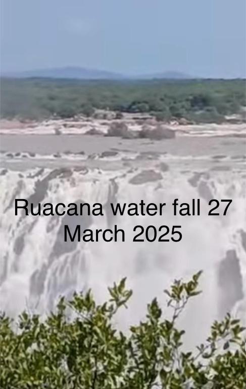 a sign that reads ryssamine water fall march at Ruacana Guest House in Ruacana