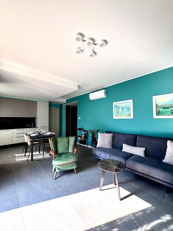 a living room with a couch and a table at Casa Mirit - Nesso in Nesso
