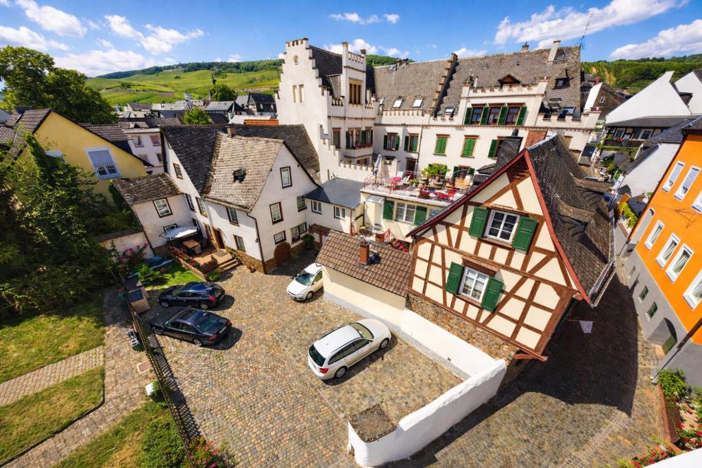 an aerial view of a small town with cars parked at Fewo Zum Malerwinkel - Rüdesheim in Rüdesheim am Rhein